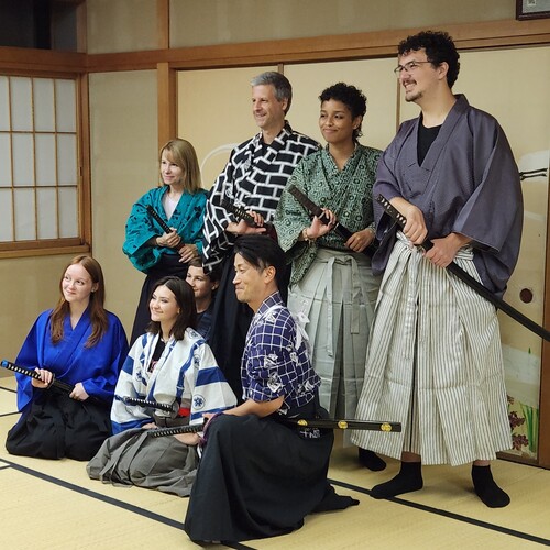 Guests learning authentic samurai sword choreography in Tokyo